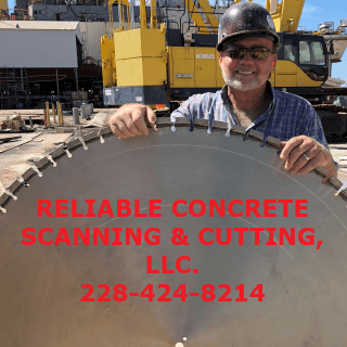Reliable Concrete LLC crew with diamond saw blade